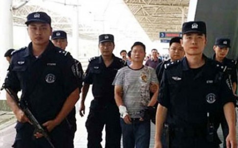 One of a number of arrests. Image source: China Police Daily